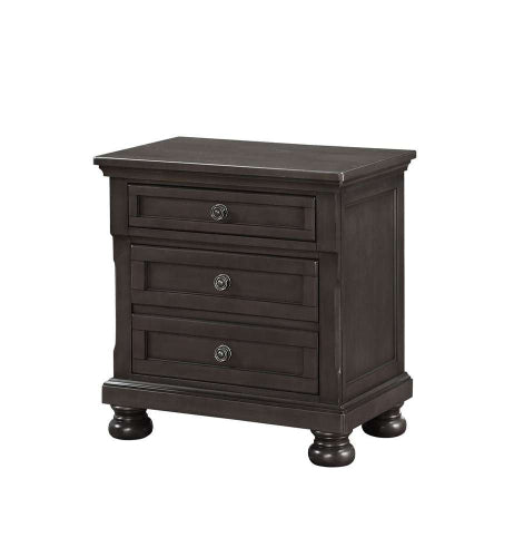 Dark wood nightstand with three drawers on a white background