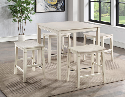 White dining table set with four stools in a room with a plant and window.